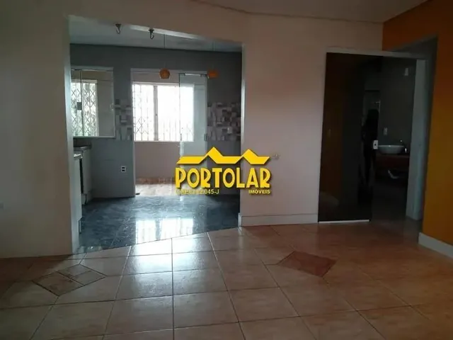 Imagem 10: Casa, em Piso Superior (Segundo Pavimento), com Dois Dormitórios, Sala com Lareira