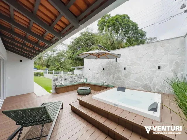 Imagem: A casa possui 3 Dormitórios, 1 Suíte, 3 Banheiros,