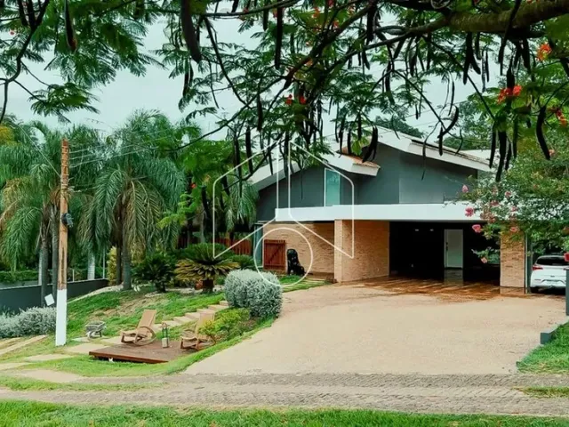 Imagem: A casa em condomínio possui 4 Dormitórios, 4 Suítes, 5