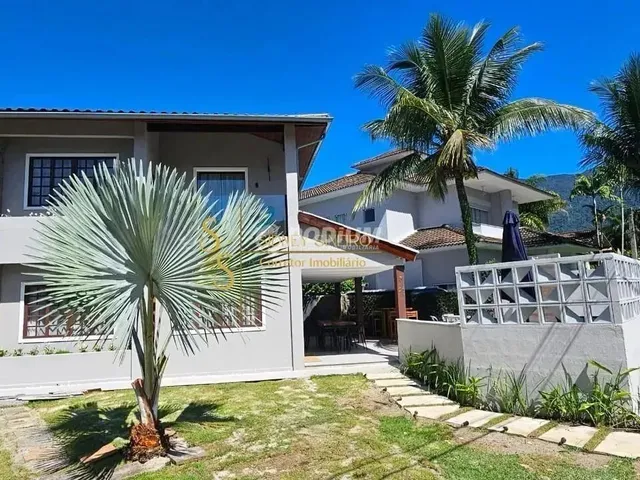 Imagem: A casa em condomínio possui 4 Dormitórios, 4 Suítes, 5