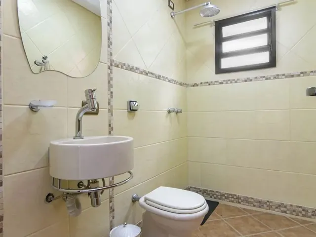 Imagem 16: Casa em Condomínio com Elevador e Bosque Privativo no Xaxim o Equilíbrio Perfeito Entre