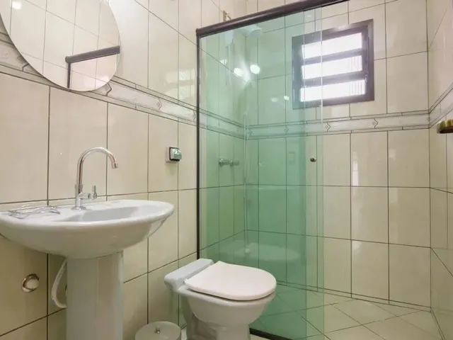 Imagem 15: Casa em Condomínio com Elevador e Bosque Privativo no Xaxim o Equilíbrio Perfeito Entre