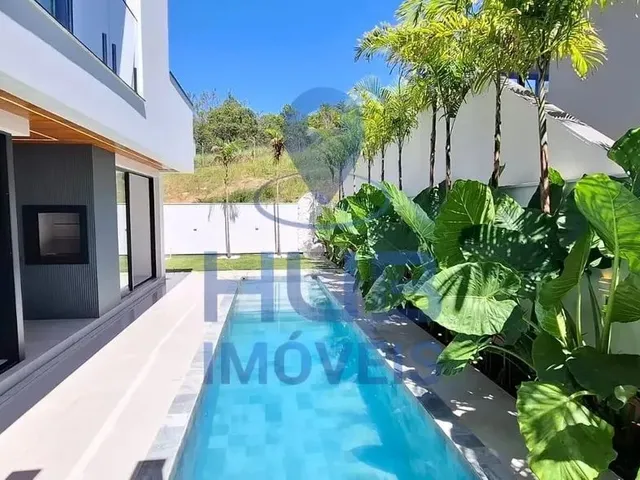 Imagem: A casa possui 3 Dormitórios, 3 Suítes, 4 Banheiros, 4