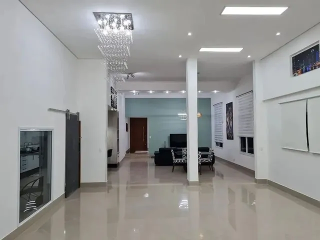 Imagem: A casa em condomínio possui 4 Dormitórios, 3 Suítes, 4