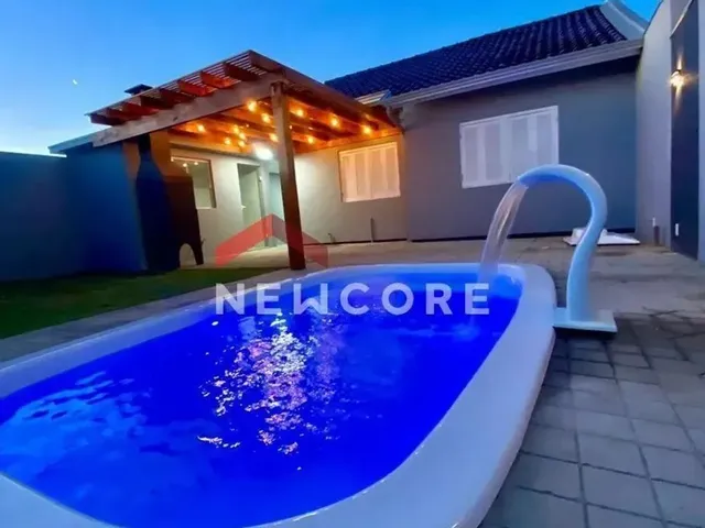 Imagem: A casa possui 2 Dormitórios, 1 Banheiro, 3 Vagas na