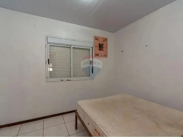 Imagem 16: Ampla Casa de 3 Dormitórios Sendo 1 com Suíte, no Morada do Bosque