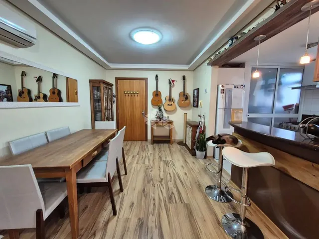 Imagem: O apartamento possui 2 Dormitórios, 1 Suíte, 2 Banheiros,