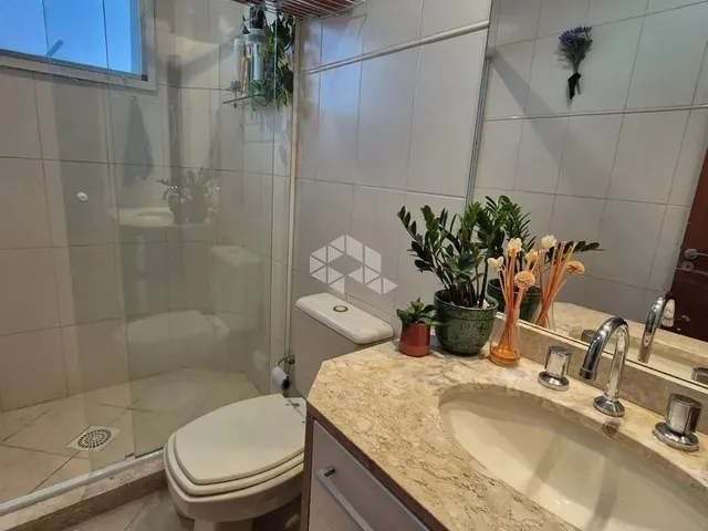 Imagem 8: Apartamento de 2 Dormitorios, Sendo 1 Suite, Sacada Fechada e Garagem Coberta e Escriturad
