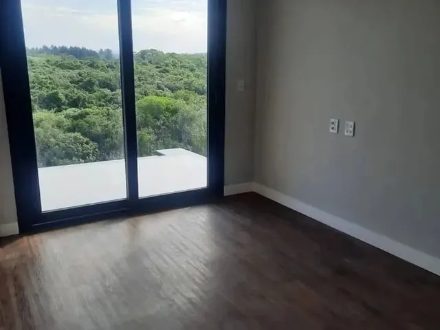 Imagem 5: Viva o Luxo e Conforto em 452M² de Puro Requinte: 4 Suítes e Área de Lazer Completa