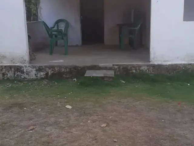 Imagem: A casa possui 2 Dormitórios, 1 Banheiro, 2 Vagas na