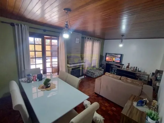 Imagem 7: No Centro de Pinhais - Uma Casa Térrea Espaçosa Espera por Você!
