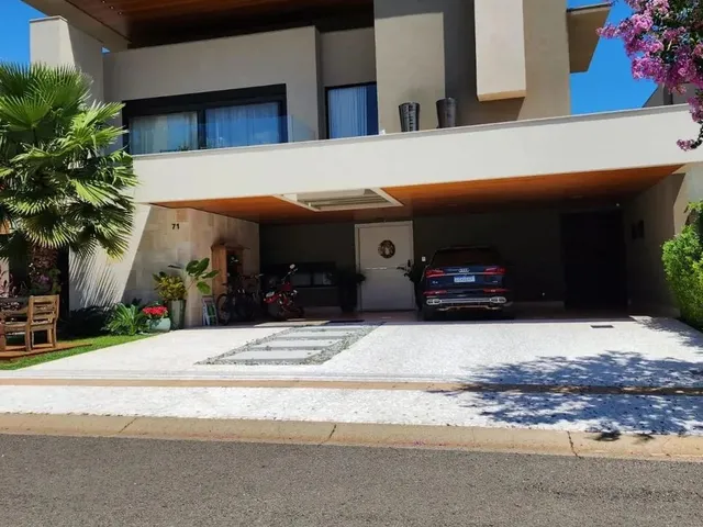 Imagem: A casa possui 4 Dormitórios, 4 Suítes, 5 Banheiros, 5