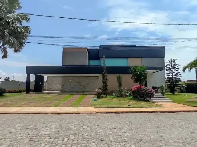 Imagem: A casa em condomínio possui 5 Dormitórios, 4 Suítes, 5