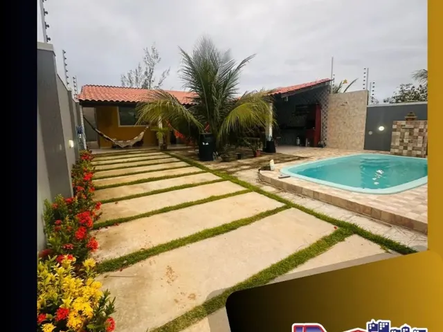 Imagem: A casa possui 2 Dormitórios, 1 Suíte, 2 Banheiros,