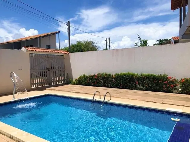 Imagem: A casa possui 3 Dormitórios, 2 Banheiros, Acomodam 30