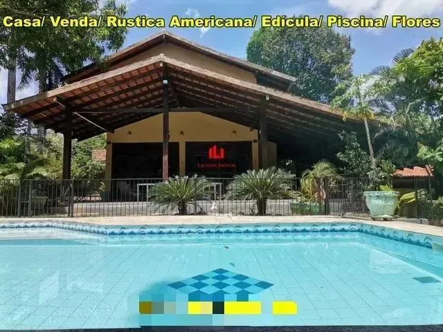 Imagem: A casa possui 5 Dormitórios, 1 Suíte, 2 Banheiros, 5