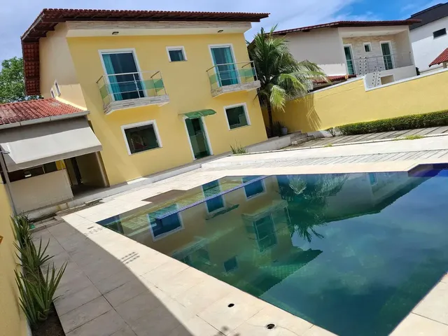 Imagem: A casa em condomínio possui 5 Dormitórios, 5 Banheiros, 4