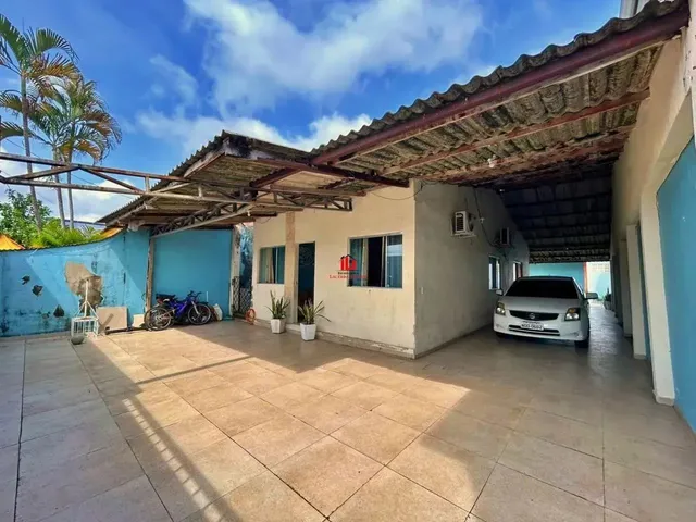 Imagem: A casa possui 2 Dormitórios, 1 Suíte, 1 Banheiro, 5 Vagas