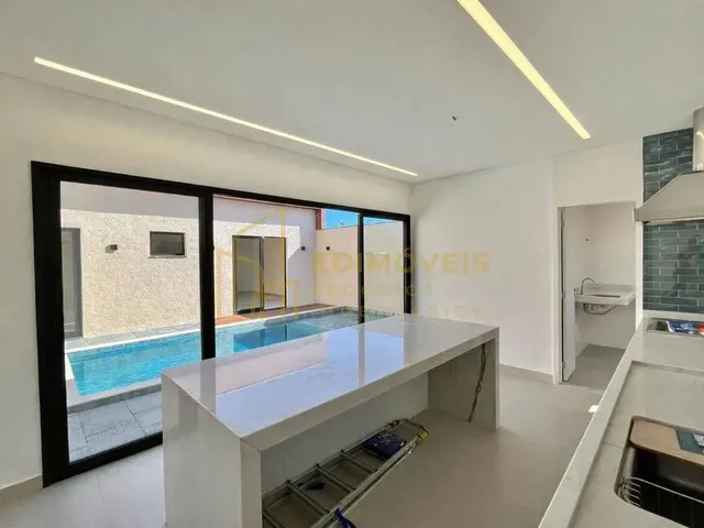 Imagem 16: Manguinhos: Casa Linear com Design Moderno e Ampla Área Social