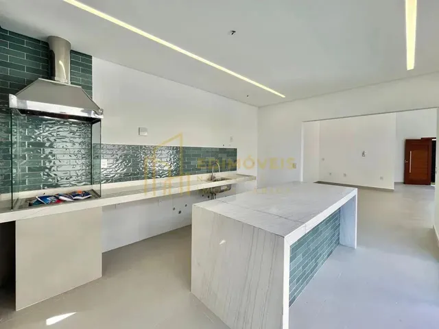 Imagem 5: Manguinhos: Casa Linear com Design Moderno e Ampla Área Social
