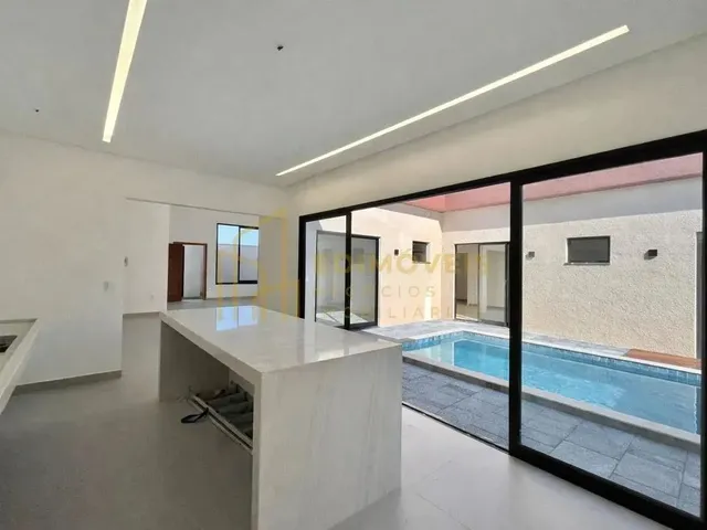 Imagem 3: Manguinhos: Casa Linear com Design Moderno e Ampla Área Social