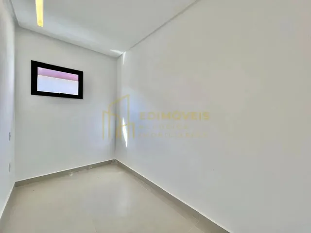 Imagem 11: Manguinhos: Casa Linear com Design Moderno e Ampla Área Social