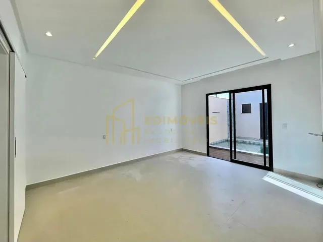Imagem 13: Manguinhos: Casa Linear com Design Moderno e Ampla Área Social