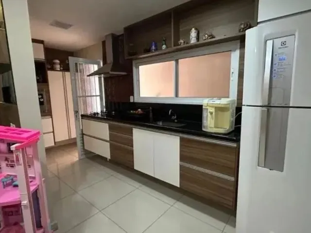 Imagem 2: Casa de Três Quartos com Suíte