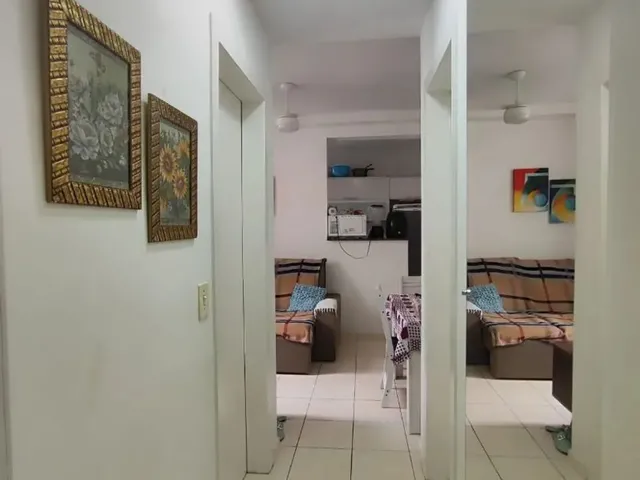 Imagem: O apartamento possui 2 Dormitórios, 1 Suíte, 2 Banheiros,