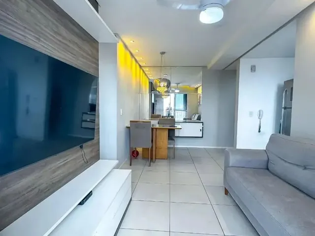 Imagem: O apartamento possui 2 Dormitórios, 1 Suíte, 2 Banheiros,