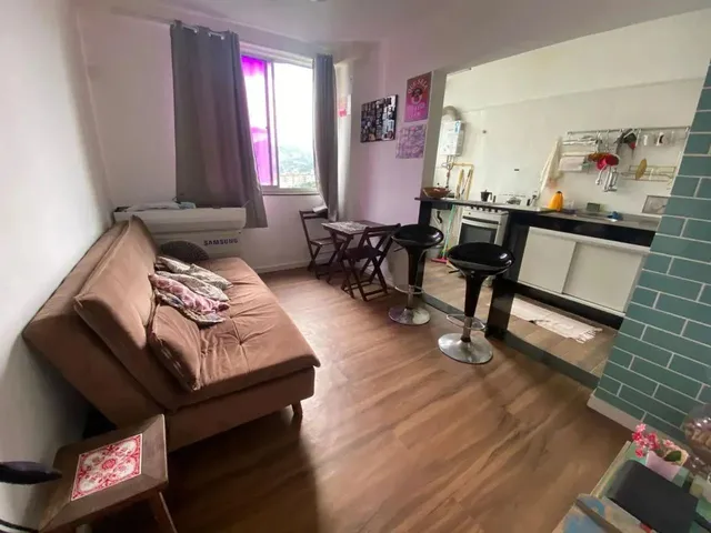 Imagem: O apartamento possui 2 Dormitórios, 1 Banheiro, 2 Vagas na