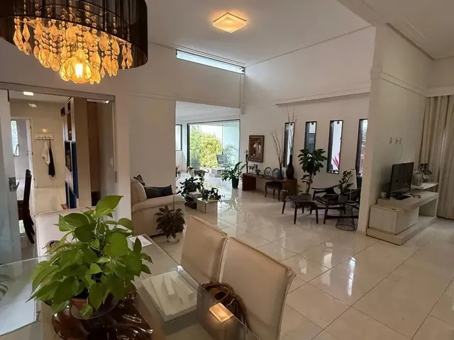 Imagem: A casa possui 4 Dormitórios, 3 Suítes, 4 Banheiros, 3