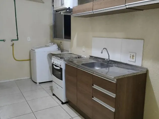 Imagem: O apartamento possui 2 Dormitórios, 1 Banheiro, 1 Vaga na