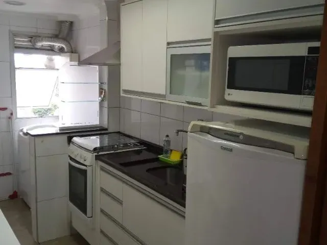 Imagem: A kitnet possui 1 Dormitório, 1 Banheiro, 1 Vaga na