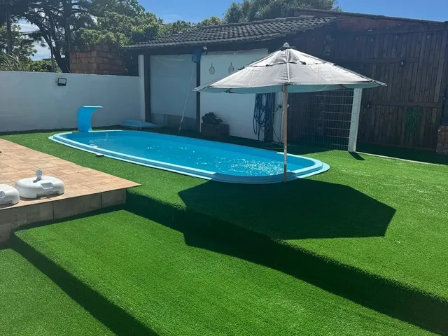 Imagem 1: Casa Ampla com Piscina para Temporada em Torres.