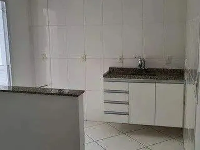 Imagem: O apartamento possui 2 Dormitórios, 1 Suíte, 2 Banheiros,