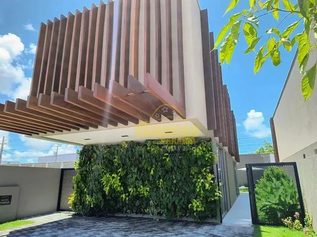 Imagem: A casa em condomínio possui 4 Dormitórios, 4 Suítes, 5
