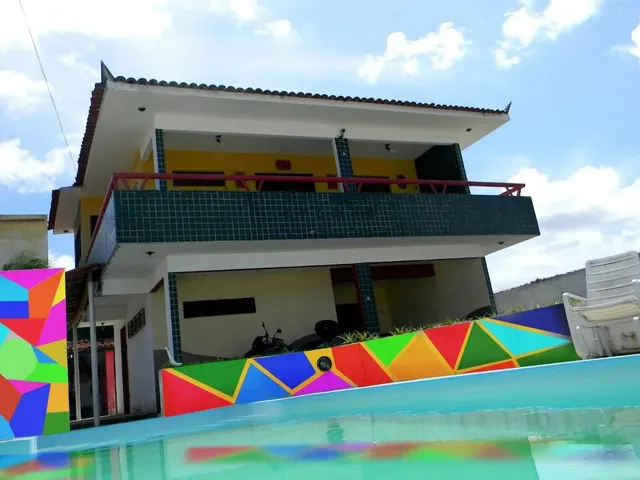 Imagem: A casa possui 3 Dormitórios, 2 Suítes, 4 Banheiros, 2