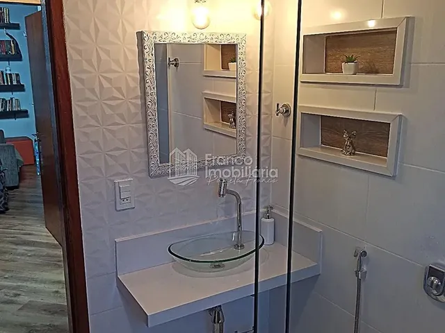 Imagem: A casa em condomínio possui 4 Dormitórios, 1 Suíte, 5