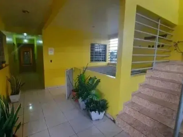Imagem: O apartamento possui 2 Dormitórios, 1 Suíte, 2 Banheiros,
