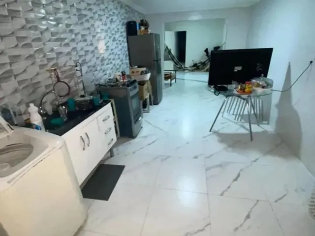 Imagem: A casa possui 2 Dormitórios, 2 Suítes, 3 Banheiros, 1