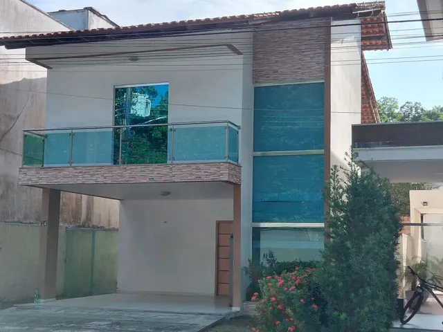 Imagem: A casa em condomínio possui 4 Dormitórios, 4 Suítes, 5