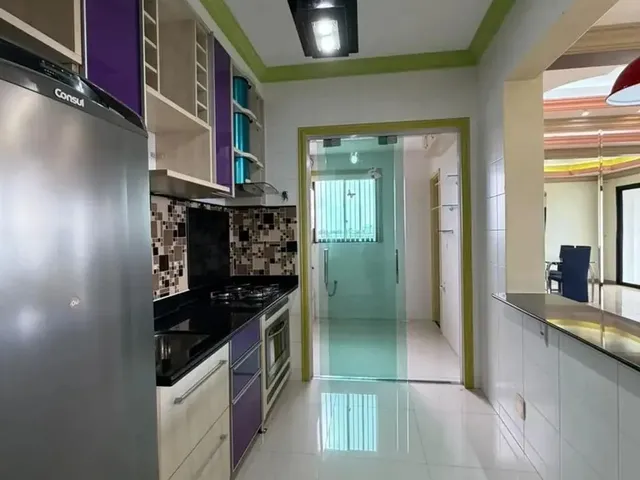 Imagem: O apartamento possui 2 Dormitórios, 1 Suíte, 2 Banheiros,
