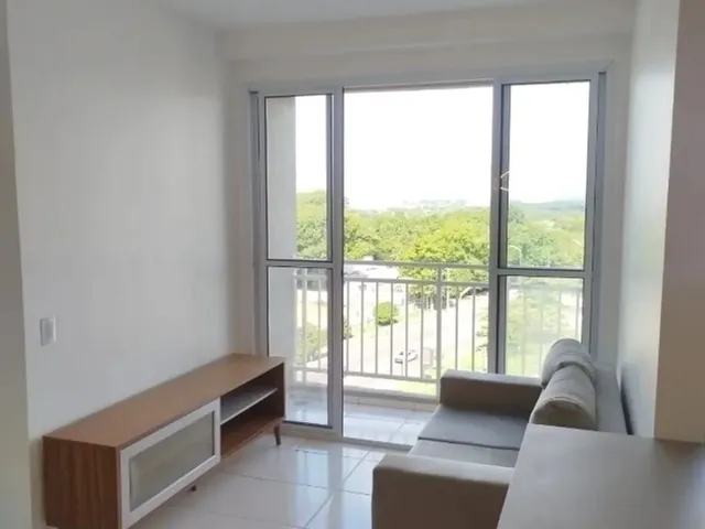 Imagem: O apartamento possui 2 Dormitórios, 1 Suíte, 2 Banheiros,