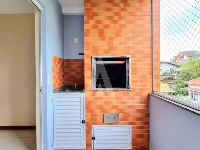 Imagem 6: Apartamento Semimobiliado com 2 Quartos Sendo 1 Suite, Sacada com Churrasqueira no Bairro