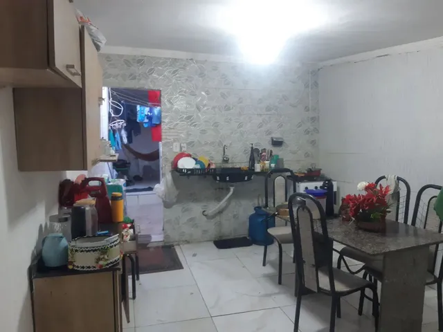 Imagem: Vendo Uma Casa com Um Prédio no Fundo