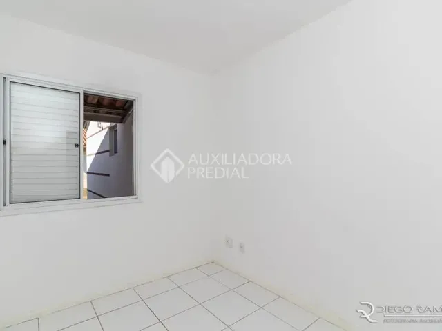 Imagem 2: Casa com 02 Dormitórios, Sendo 01 Suíte, Living 02 Ambientes