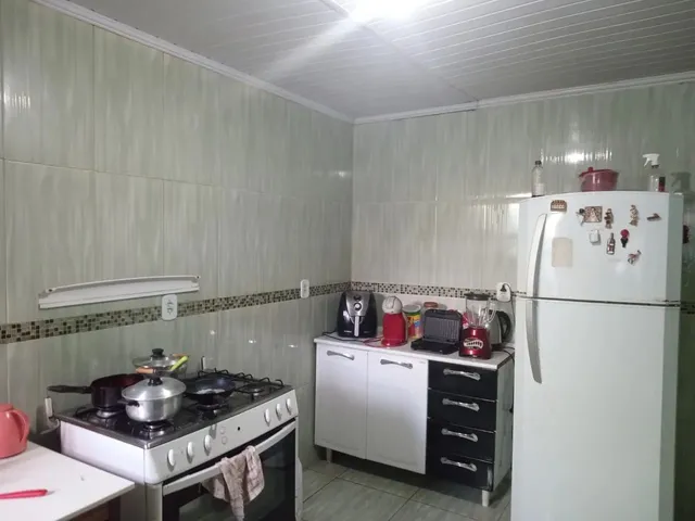 Imagem 3: Lote com Casa de Frente e Fundo