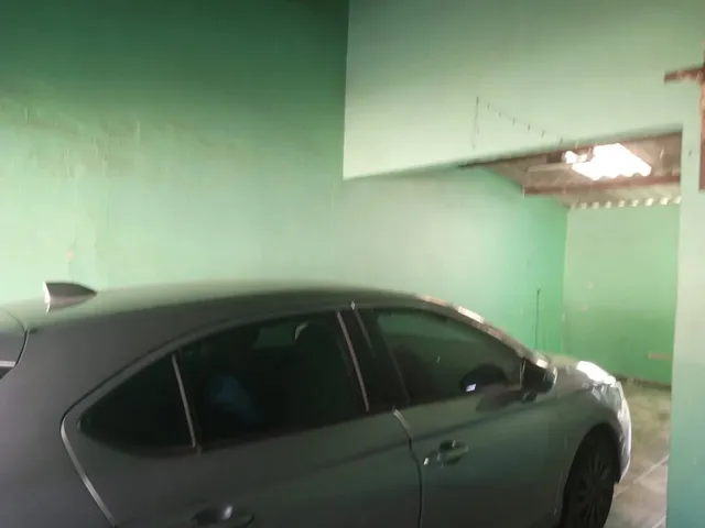 Imagem 7: Lote com Casa de Frente e Fundo
