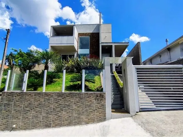 Imagem: Casa Aconchegante com Espaços Amplos e